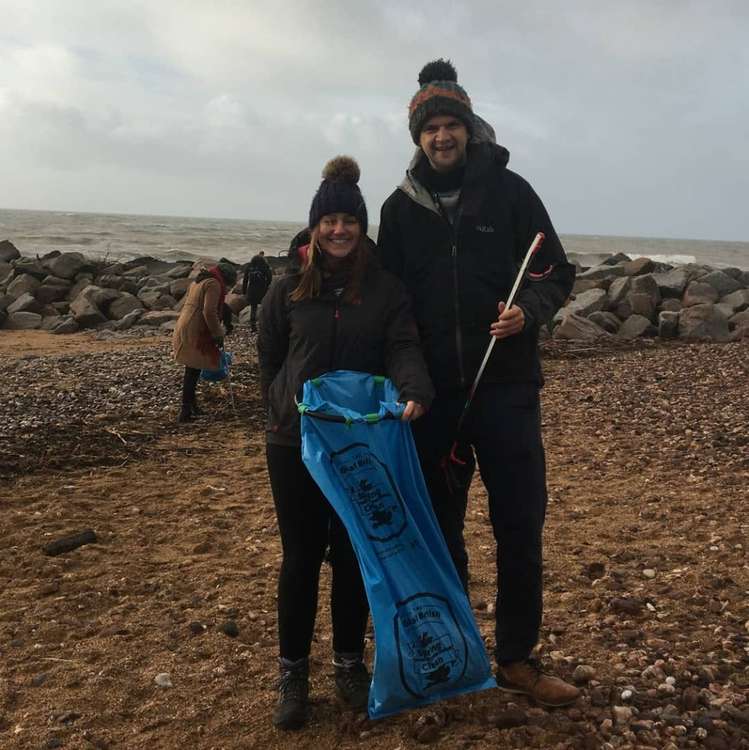 More than people 100 took to West Bay for a beach clean in memory of Simon Jordan (Image: courtesy of Roy Beal)