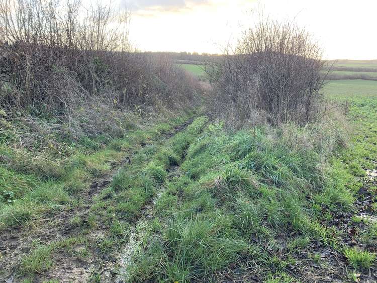 Take the second right down a footpath