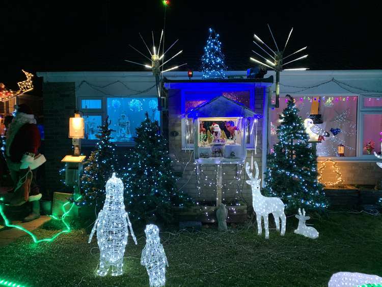 The Christmas lights in White Close, Bradpole, switched on by Martin Clunes raise more than £1,000 for Weldmar Hospicecare