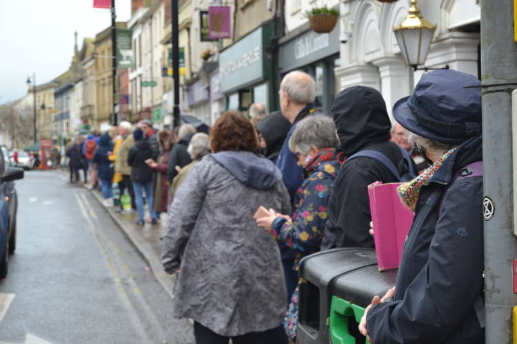 Crowds lined the street in anticipation of the Olympian's arrival