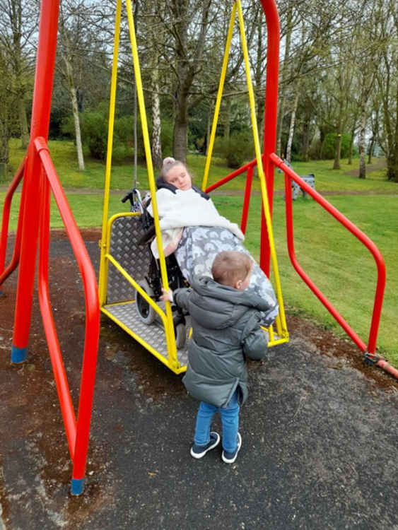 Evie and her brother Max Denney in the gardens at Little Havens.