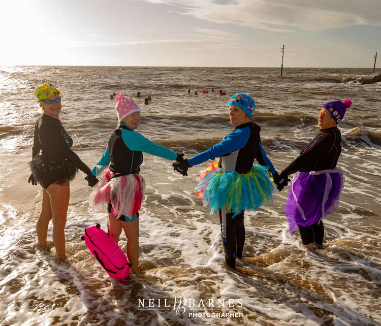 Bridport Bluetits marking 'tu-tu-tu Tuesday' wearing tutus at West Bay (Image: Neil Barnes)