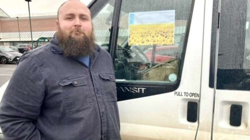 Tom Littledyke, pictured with his mini bus en route to the Ukrainian border with supplies