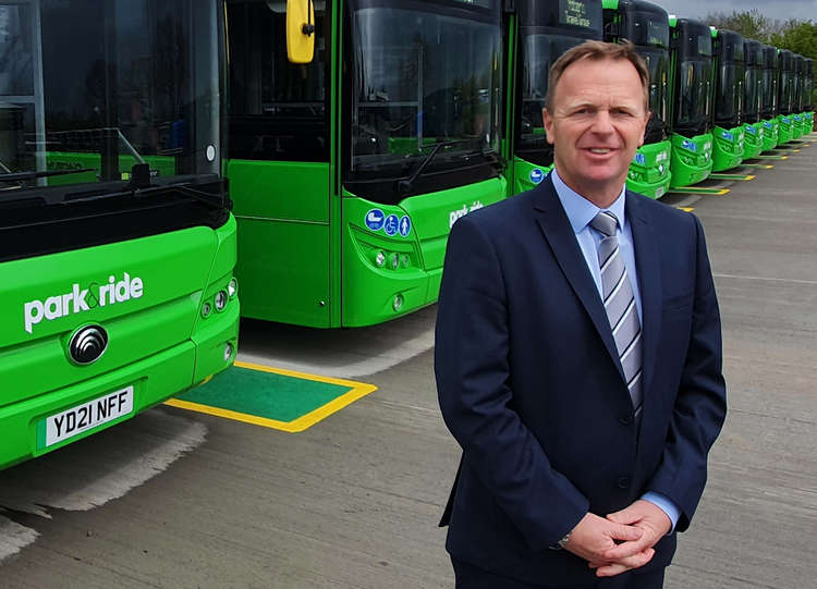 Roberts Travel Group managing director, Jonathan Hunt, in front of the Leicester Park and Ride vehicles