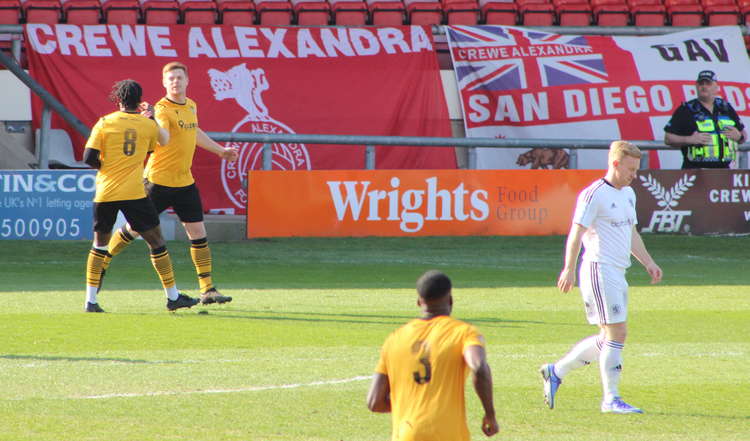 The penalty is scored and celebrated.