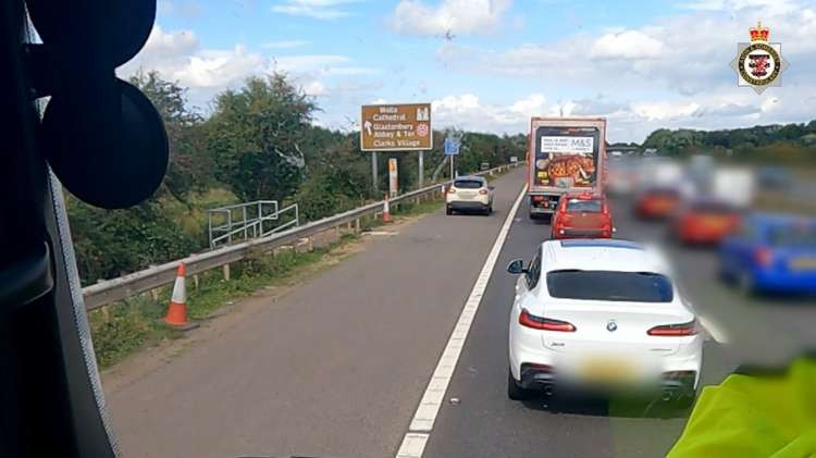 The driver of the Renault Captur received a traffic summons after being filmed by Avon and Somerset Police from a National Highways cab