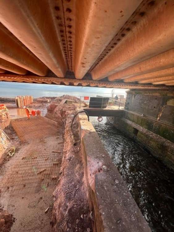 Diverting the Brook at the stilling basin (Network Rail)