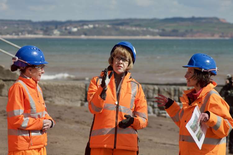 L to R: Anne Marie Morris MP, Minister of State for Transport Wendy Morton MP, Network Rail representative at Coryton Cove, Dawlish (Nub News, Will Goddard)