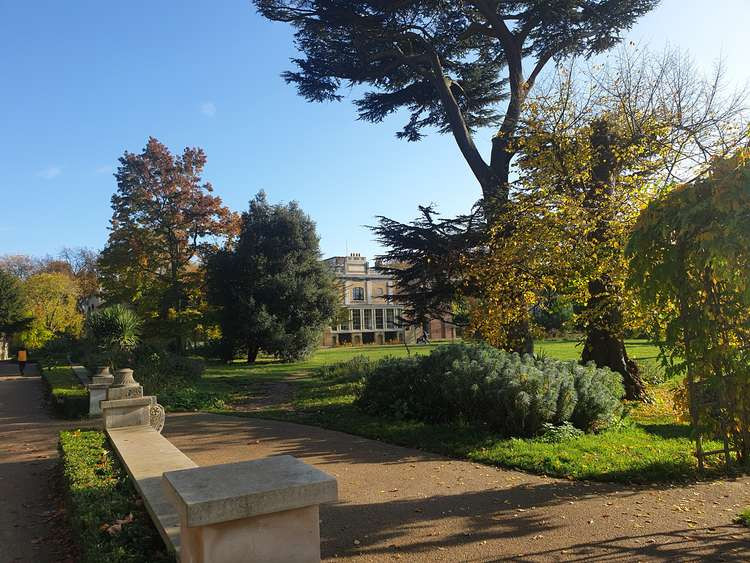 Pitzhanger Manor peeking through the autumn trees. (Image: Hannah Davenport)