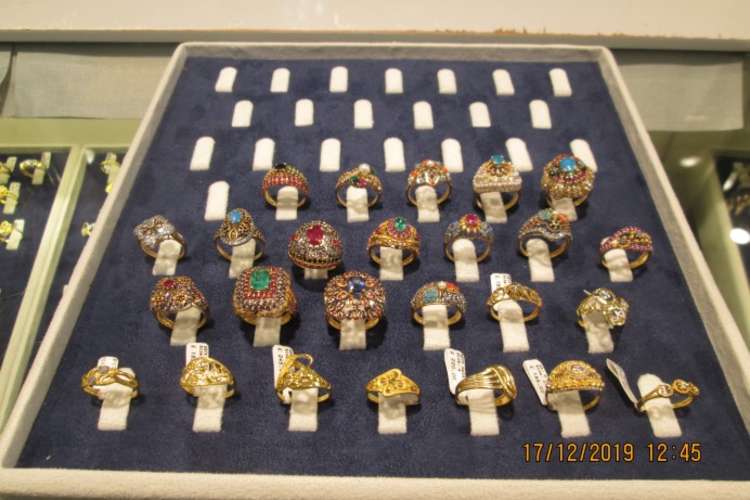 Sixteen gold rings, one gold pendant, and two three-piece gold pendant sets were seized. (Image: Ealing Council)