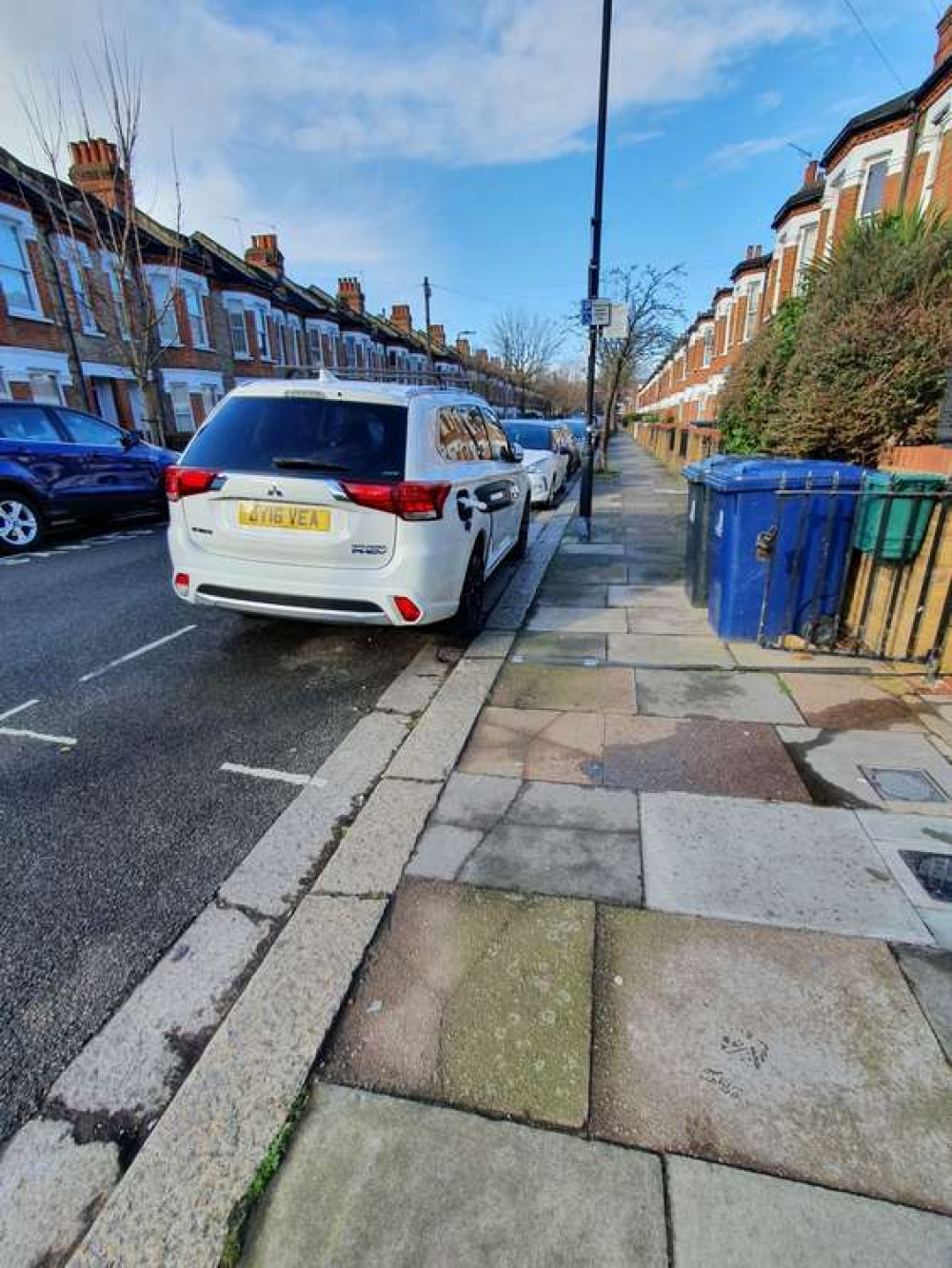 Car privately charging in Clovelly Road Chiswick