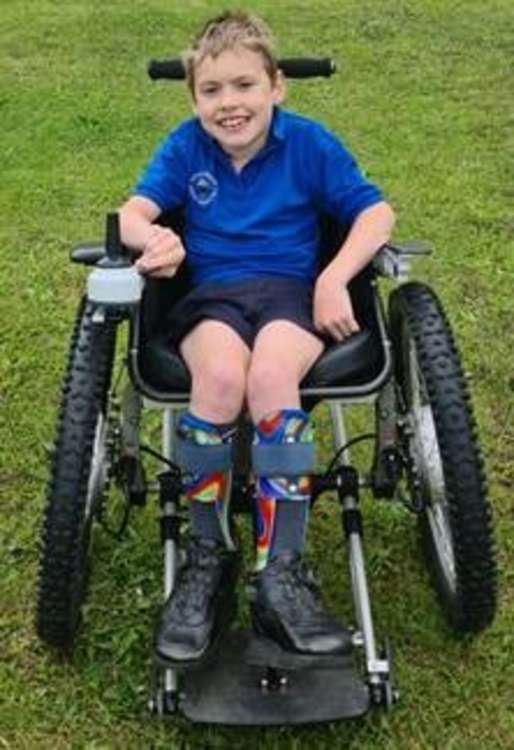 Eight-year-old Henry, who received a specialised electric wheelchair from the 'Ben's Gift' appeal.