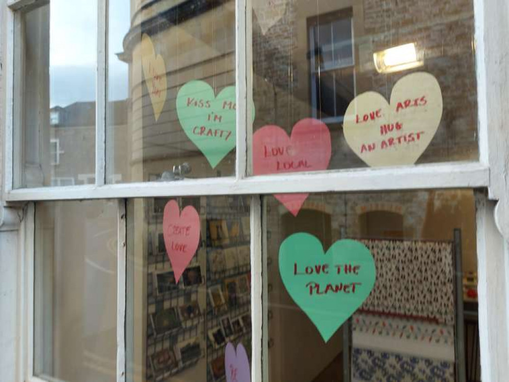 Valentine's Day is not all hearts and flowers for everyone. The window of Black Swan Arts