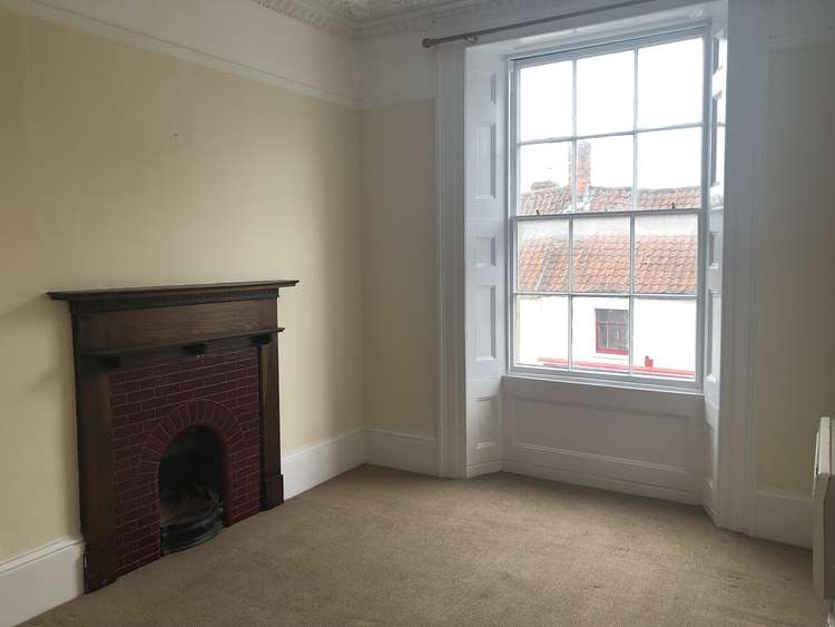 The open plan kitchen/sitting room overlooks Glastonbury High Street