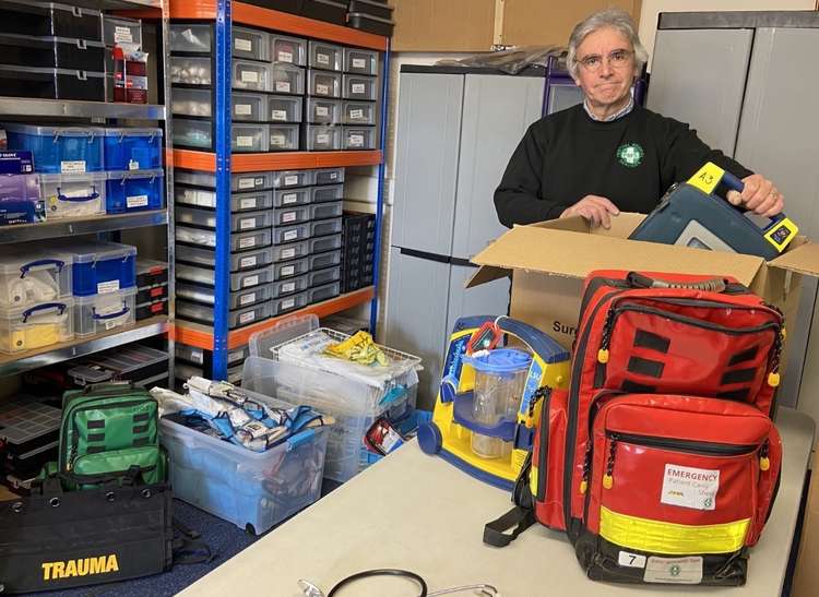 Dr Chris Howes with some of the Trauma Boxes