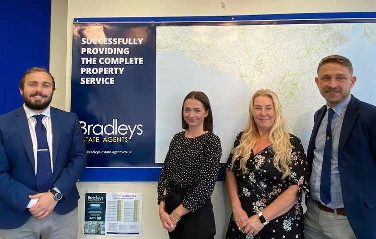 The Bradleys Estate Agents team. Paul Suddes, Lydia Catherall and Lorraine Hockley with Martin.