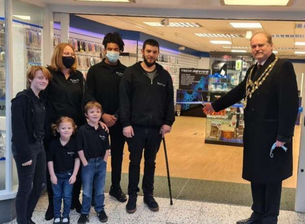 Danny (Tech Revive owner) with family, and mayor Tim Grattan Kane, open the new shop.