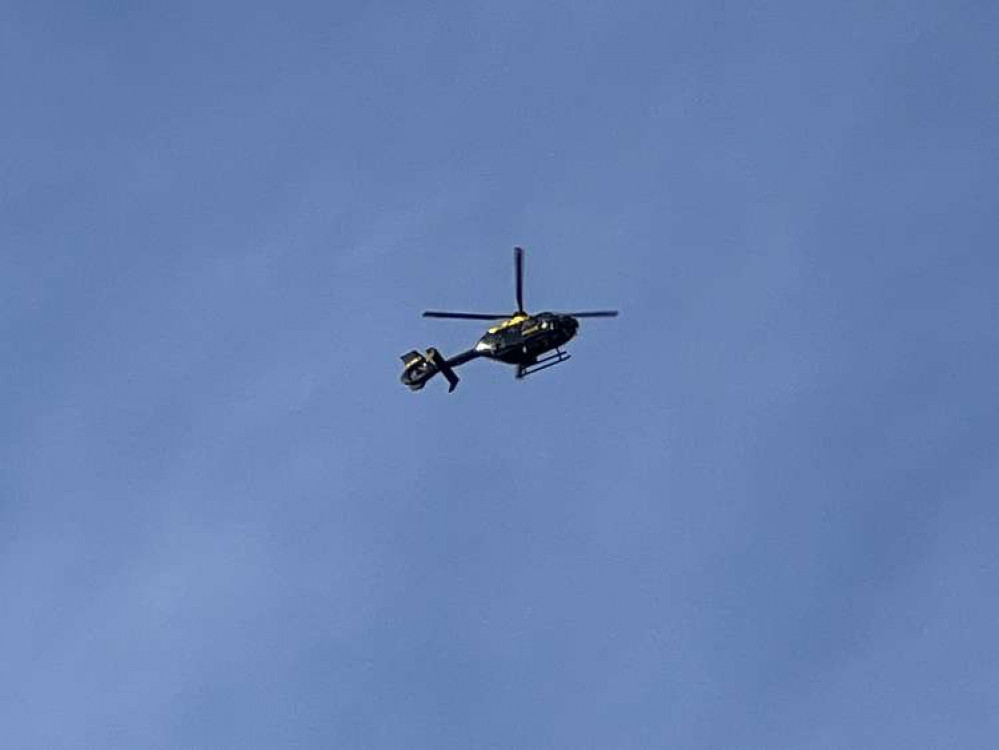 Update: Hitchin Westmill incident. PICTURE: A police helicopter flew above the incident in Westmill at the weekend. CREDIT: @HitchinNubNews