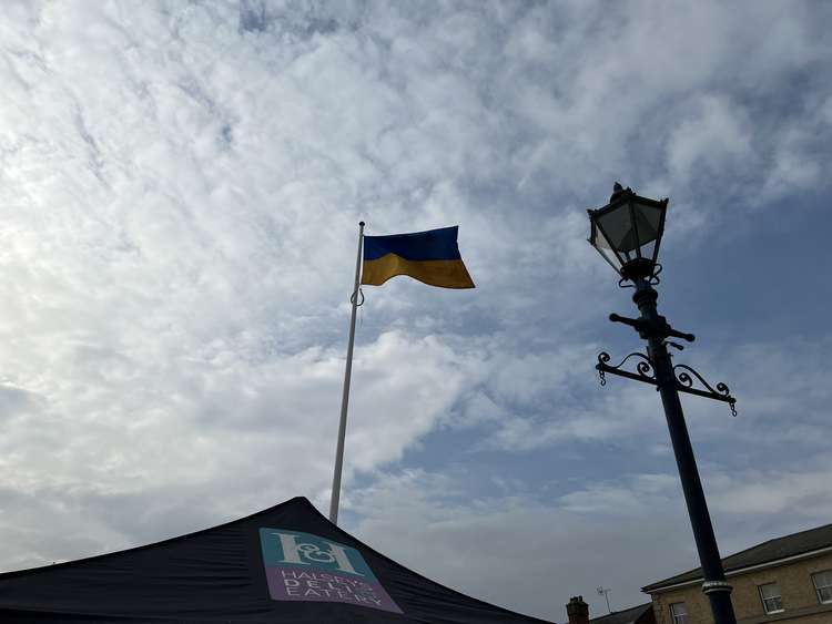Ukraine flag flies proudly in Hitchin Market Place in solidarity with its brave people. CREDIT: @HitchinNubNews