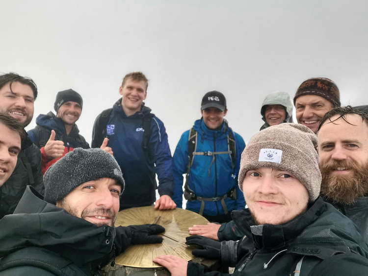 Hitchin hiking heroes climb Three Peaks and raise more than £10,000 for charity to honour much-loved colleague