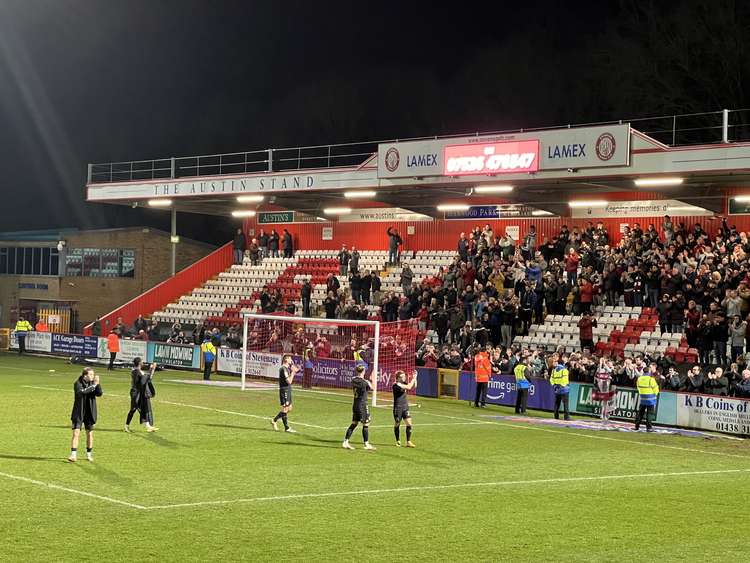 Stevenage 1-2 Northampton Town: Cobblers move to second after victory. PICTURE: The Northampton team celebrate victory with their travelling fans at the Lamex on Tuesday evening. CREDIT: @laythy29