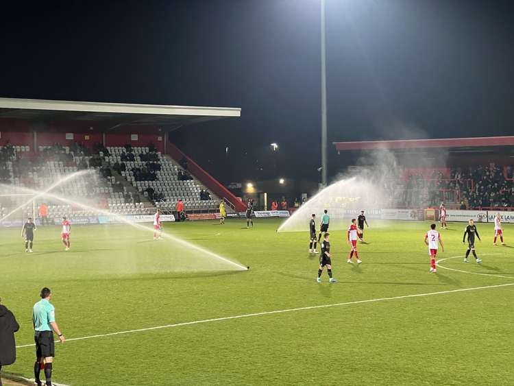 The sprinklers came on accidentally in the opening stages of the match as you can see by our picture. CREDIT: @laythy29