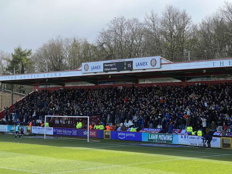 Stevenage 0-1 Oldham Athletic: New Boro boss Steve Evans says John Sheridan's Latics came in balaclavas and stole three points. PICTURE: Oldham Athletic's vociferous travelling fans celebrating moments after Jamie Hopcutt's 15th minute goal wh