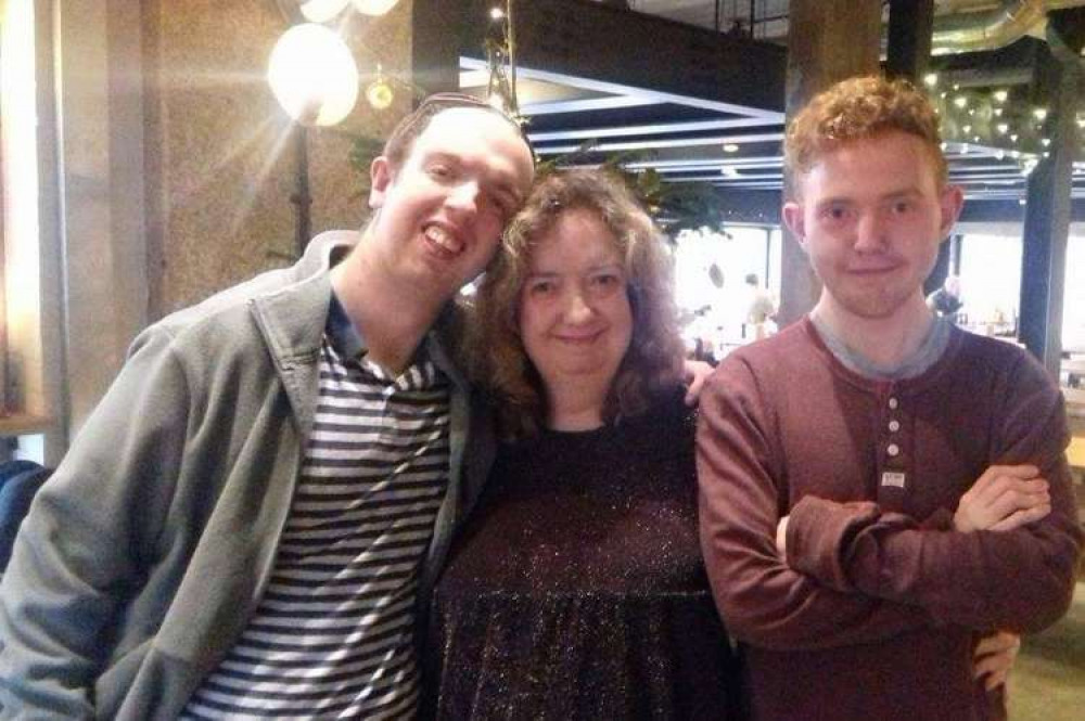 Elsie with sons James (Left) and Sammy (right, in red). Photo Credit:  Elsie Stanbury