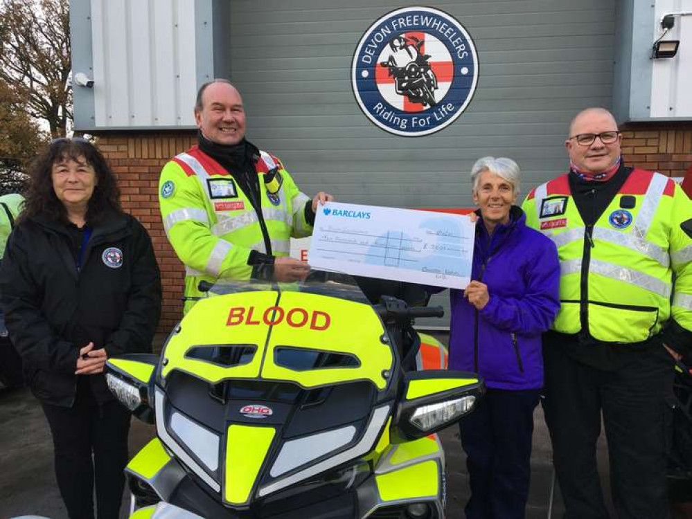 Photo: Pictured here (Left to Right) is Devon Freewheelers volunteer Vikki Finney, Blood Biker and duty rider Terry Dormer, Iris Butler, Churston Golf Club ladies captain from 2020-2021, and deputy CEO, Russell Roe. Image: Devon Freewheelers.