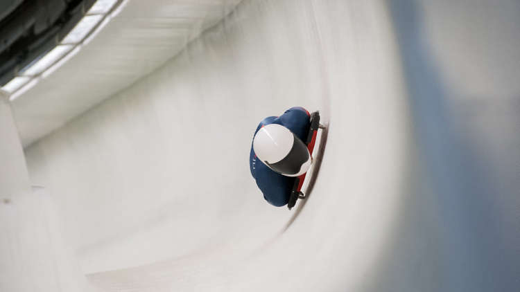 Sliding around a corner in Lake Placid, New York State, USA. Credit: Rekords