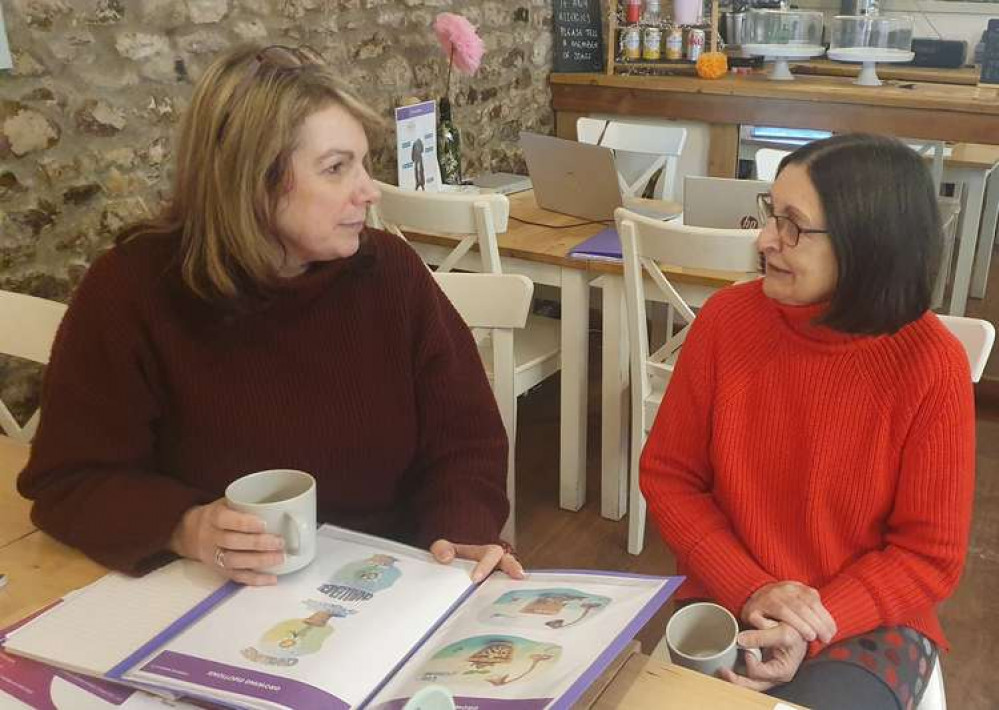 Sarah Lou Glover and volunteer Shelia Edwards in Zest Cafe, where the Hubs are held