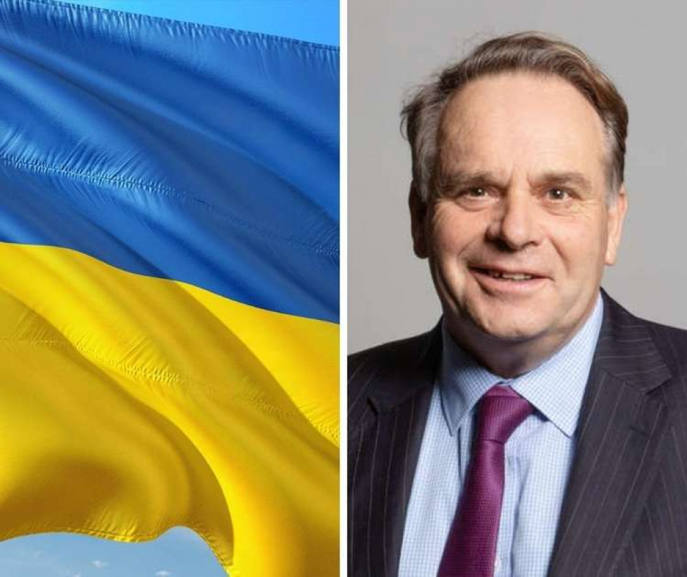 Neil Parish has called for tough sanctions. (L-R Ukrainian flag - Neil Parish (Credit: Richard Townshend - https://members-api.parliament.uk/api/Members/4072/Portrait?cropType=ThreeTwoGallery: https://members.parliament.uk/member/4072/portrait, CC BY 3.0,