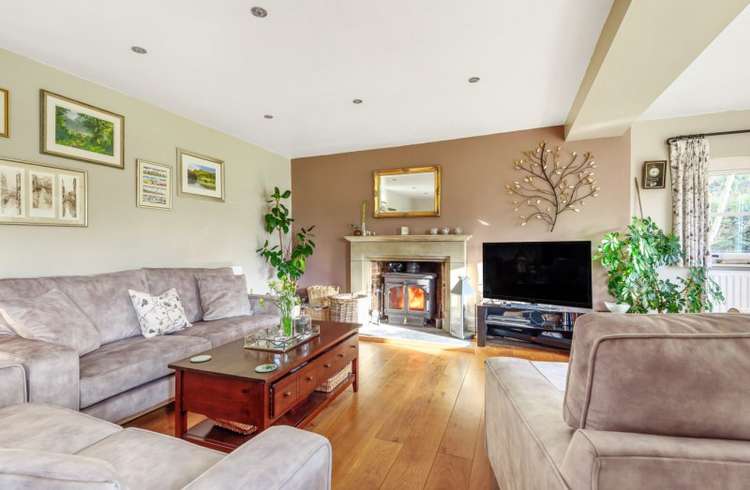 The sitting room is spacious and attractive. Credit: Bradleys Honiton.