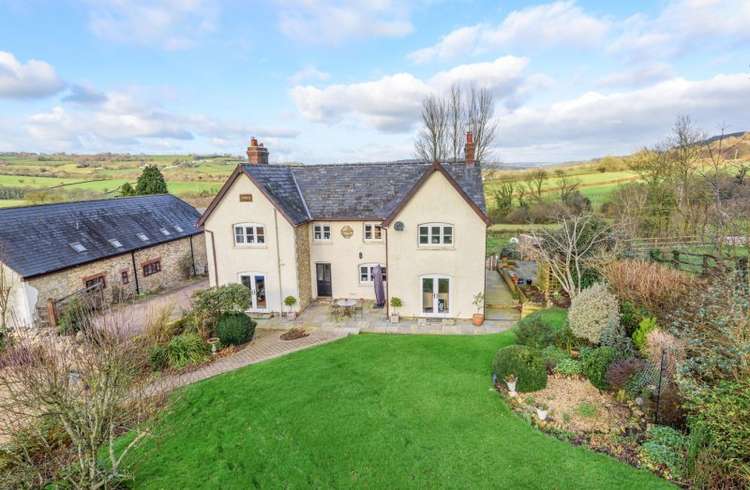 The house has grounds of 1.85 acres. Credit: Bradleys Honiton.