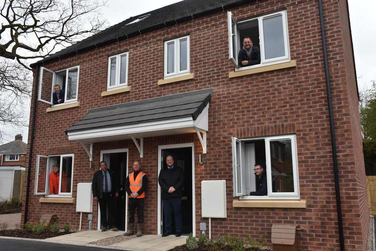 The once derelict site in Hucknall now has five family homes on it. Pictured: Cllr Jason Zadrozny, Cllr Tom Hollis, Paul Parkinson, Phil Warrington and Andrew Kirkland from Ashfield District Council's Housing Team and Freddy Chambers, Jack Damarell and