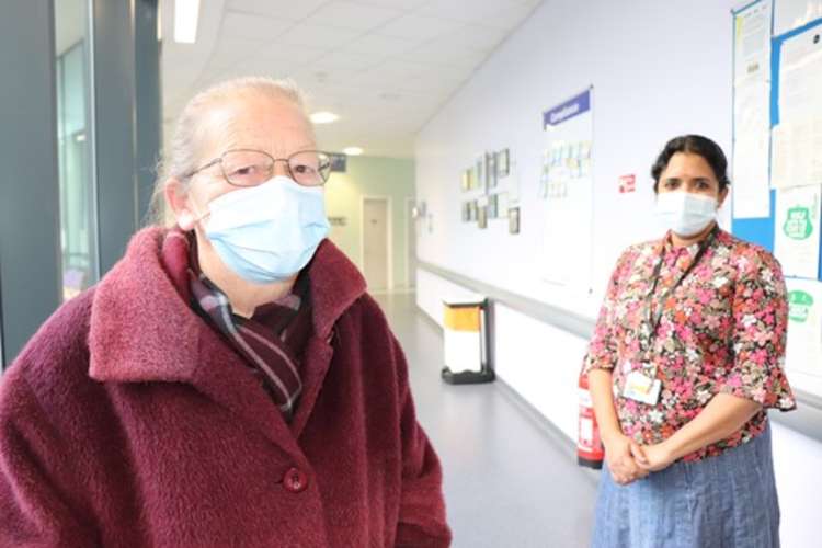 Valerie Evans, patient, with Dr Apurna Jegannathen, at the cancer centre at Royal Stoke University Hospital