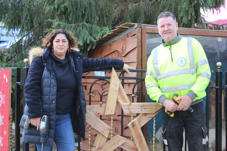 Grow Macclesfield's Alex Eifflaender and Macclesfield Town Ranger Andy McKeith helped install the recycled wood.