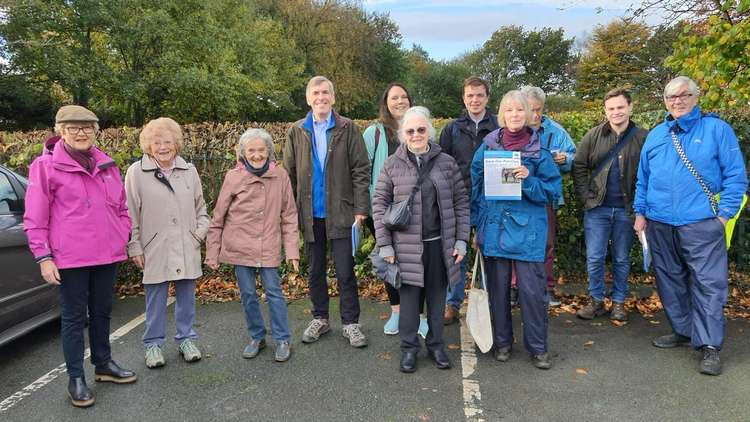 David Rutley MP (fourth from left) and Councillor Lesley Smetham (front, left) at Gawsworth Village Hall before a "Save Our Parishes" leaflet drop in the area.