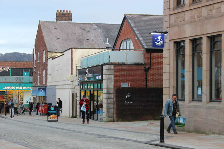 People entering indoor spaces in Macclesfield like stores or public transport should wear a mask from today, or risk a fine.