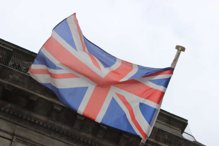 A British flag flies outside Crewe Town Hall. The town 21 miles from Macclesfield could become Cheshire East's first city next year.