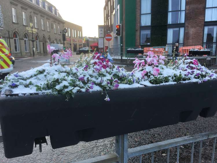 Winter is coming Macclesfield: A snow-capped flowerpot on Churchill Way, looking towards Castle Street.