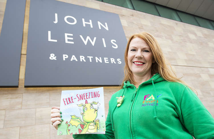 Fay with her 2017 creation, outside a John Lewis. You can view the 2019 John Lewis advert above. Fay Evans, Children's Author (Pic Credit: Tanya Lloyd Photography)