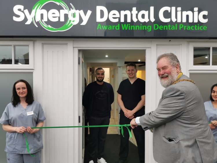 Macclesfield Mayor Cllr David Edwardes, of Tytherington, cuts the ribbon for Synergy Dental Practice on Chestergate. (Image - Synergy Dental Practice)