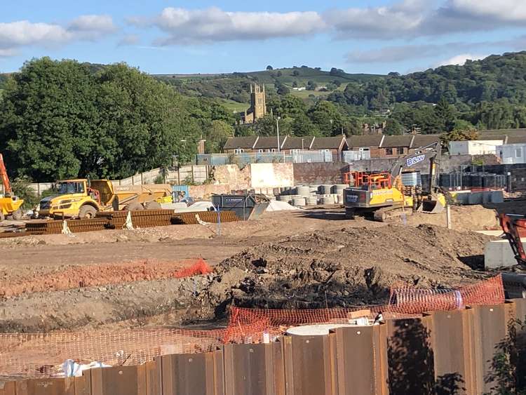 The road closure is to prepare for a permanent access point to the Barracks Mill development, from The Silk Road. Please note: This shot is from the Tesco carpark side of Barracks Mill, not The Silk Road side! That shot would be a little too dangerous for