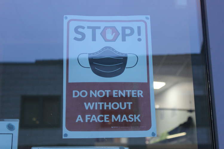 Facemask signage at the Waters Green Medical Centre.