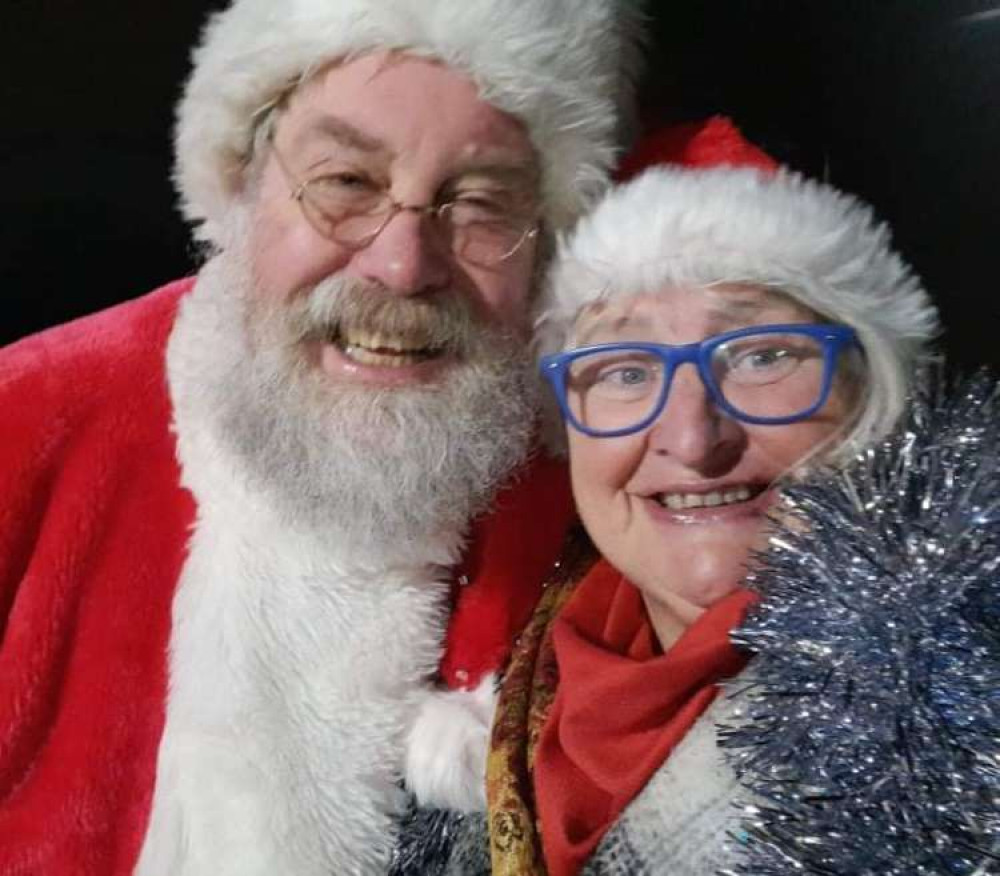 The Santa-clad Mayor of Macclesfield David Edwardes, with ward resident Sue.