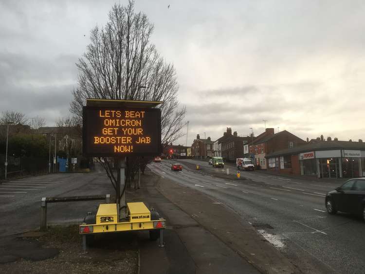 A vaccination sign on Hibel Road, just a few yards away from the Macclesfield Commercial Road test site centre.