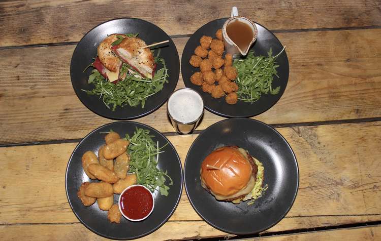 From top left to bottom right: veggie pastrami bagel, Vegan popcorn chicken, cheesy jalapeño bites and a vegetarian burger. Their veggie burger is a particular highlight, which tastes just like the real thing!