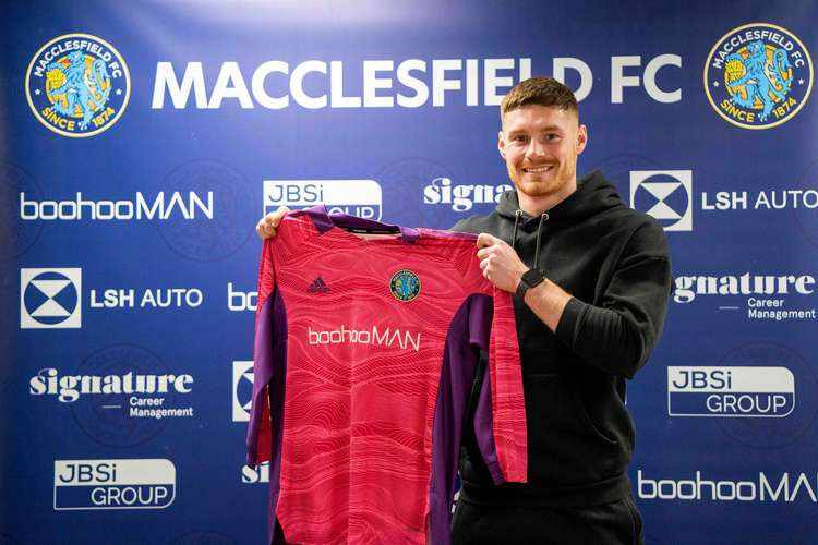 Englishman Dan Wallis is six foot zero inches, and Macclesfield FC's latest signing.