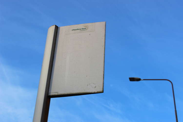 Near solicitors SAS Daniels LLP and Macclesfield's Jobcentre Plus, you can find this bus stop sign destroyed by the weather and pollution.